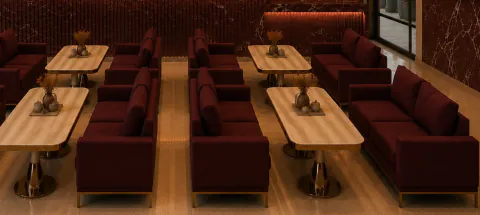 Bordo koltuklar ve alçak masalarla lounge